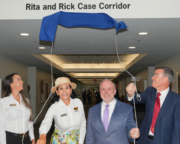 Rita Case and others unveil the named corridor at Cleveland Clinic Weston Hospital