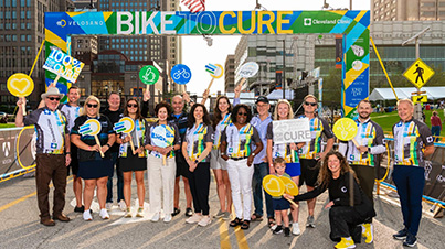 A group of Cleveland Clinic Caregivers at the VeloSano 2025 finish line.