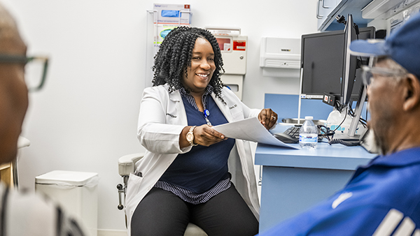 Lakeshia Gibson, MD smiling at patients