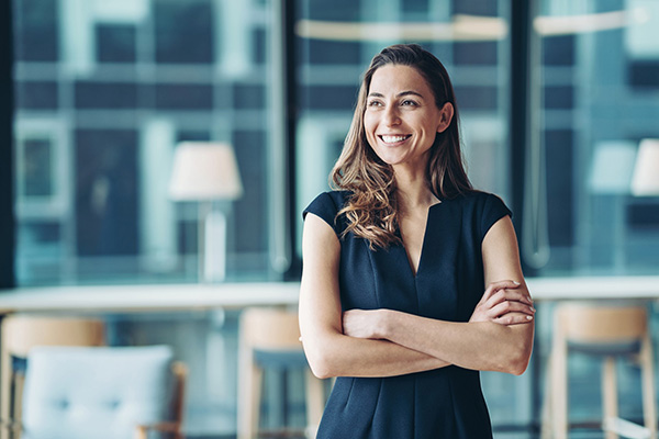 Woman crossing her arms and smiling
