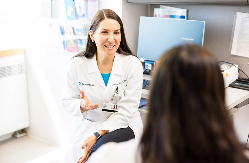 Dr. Batur and a patient talking